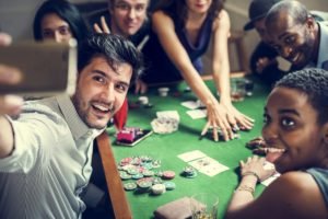 Group of people playing in casino